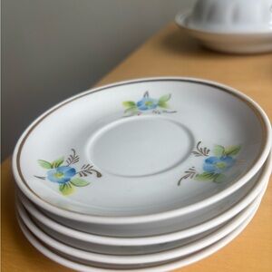 White Ceramic Saucer with Blue Floral Accent